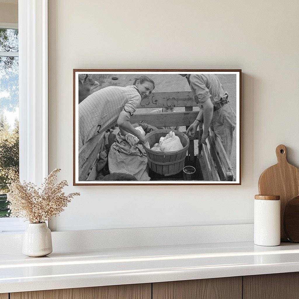 Elmer Thomas Family Unloading Food July 1939