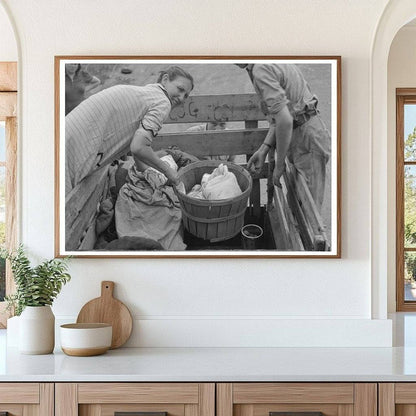 Elmer Thomas Family Unloading Food July 1939