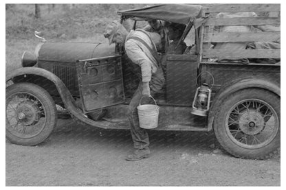 Migrant Collecting Water by Roadside Henrietta Oklahoma 1939