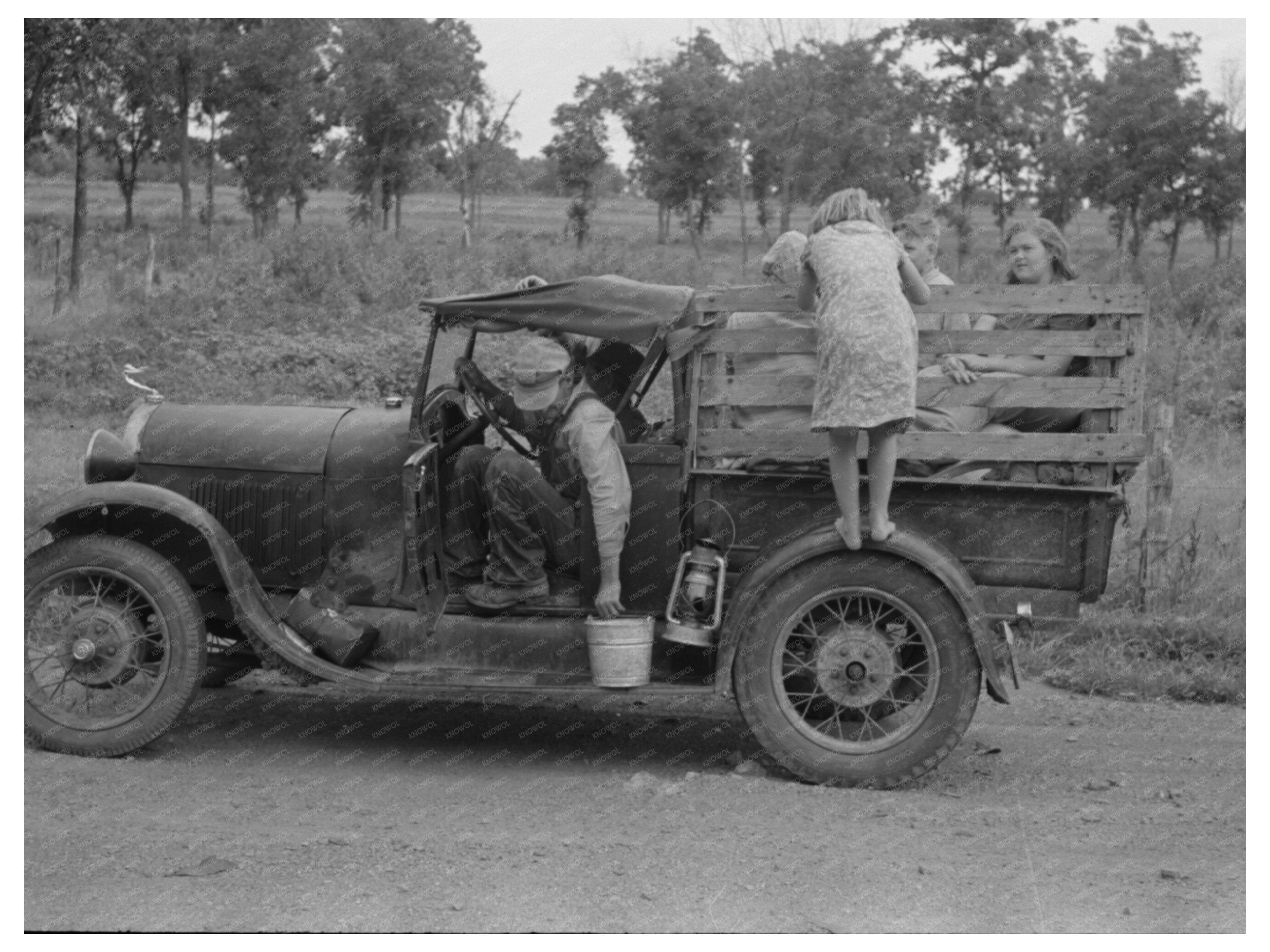 Migrant Family Collecting Water Oklahoma July 1939