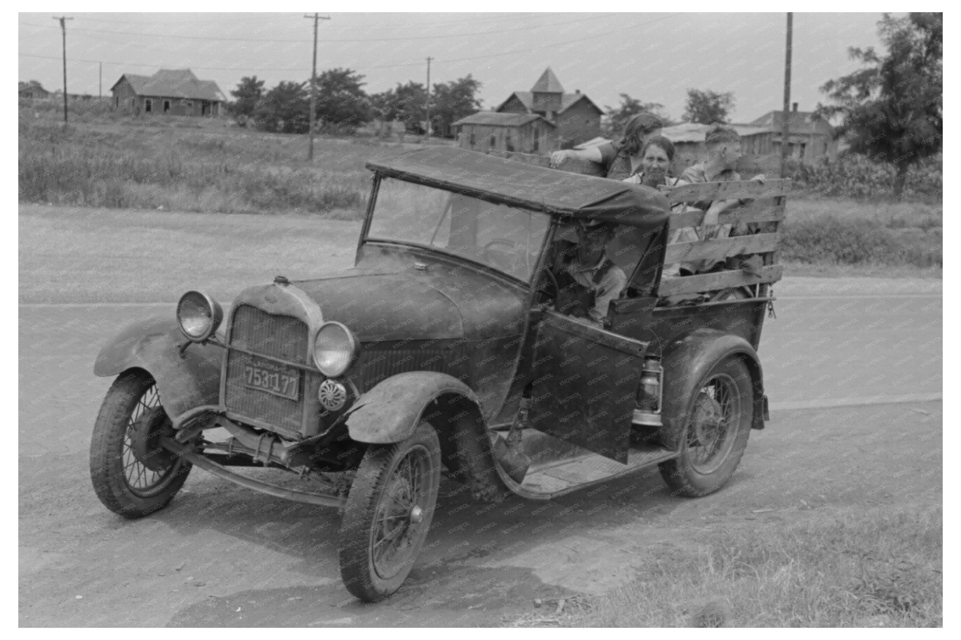 Migrant Family Car Near Henrietta Oklahoma July 1939