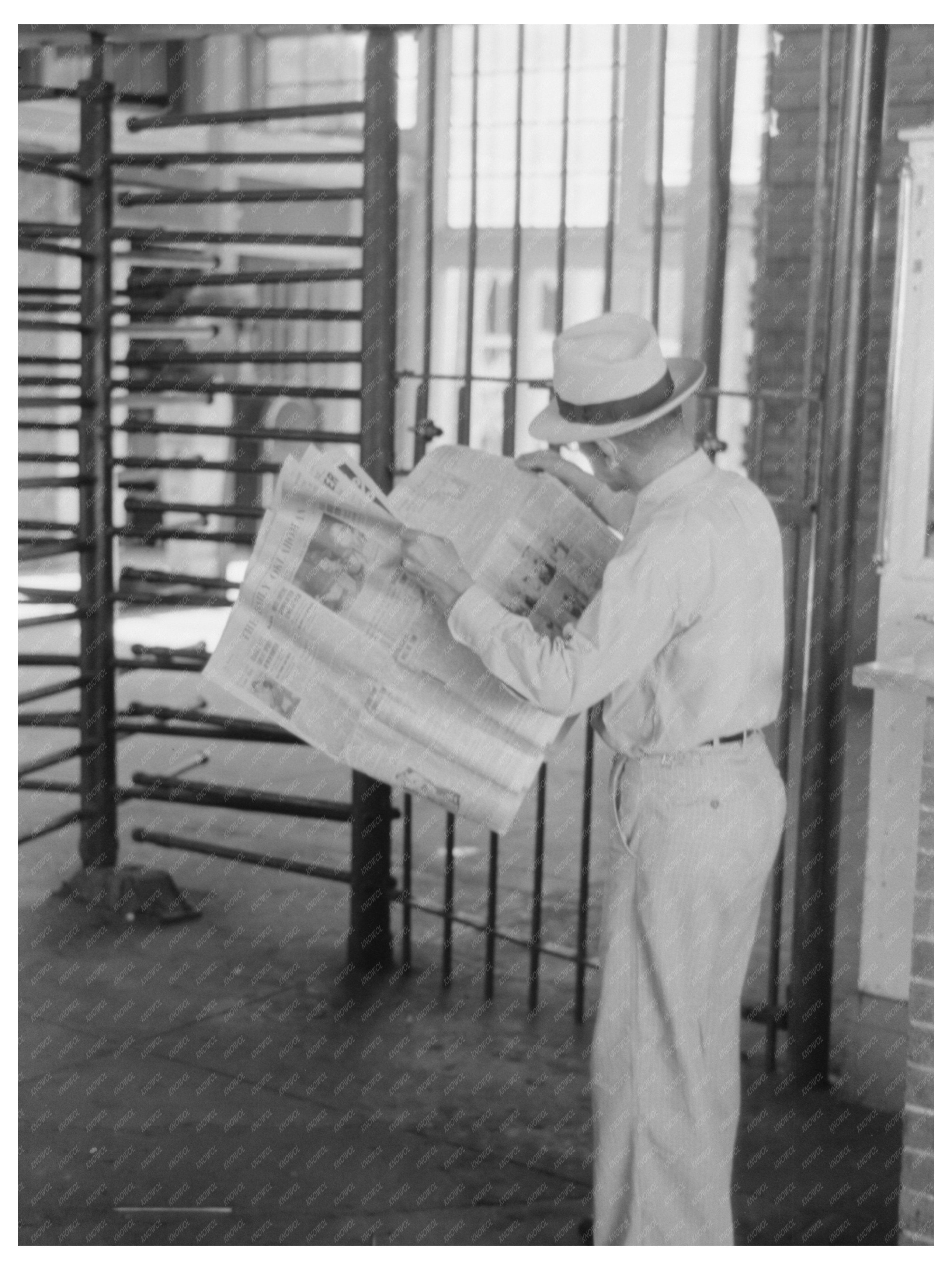 Man Reading Newspaper at Oklahoma City Streetcar Station 1939