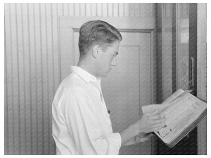 Man Searching Phone Number at Oklahoma City Streetcar 1939