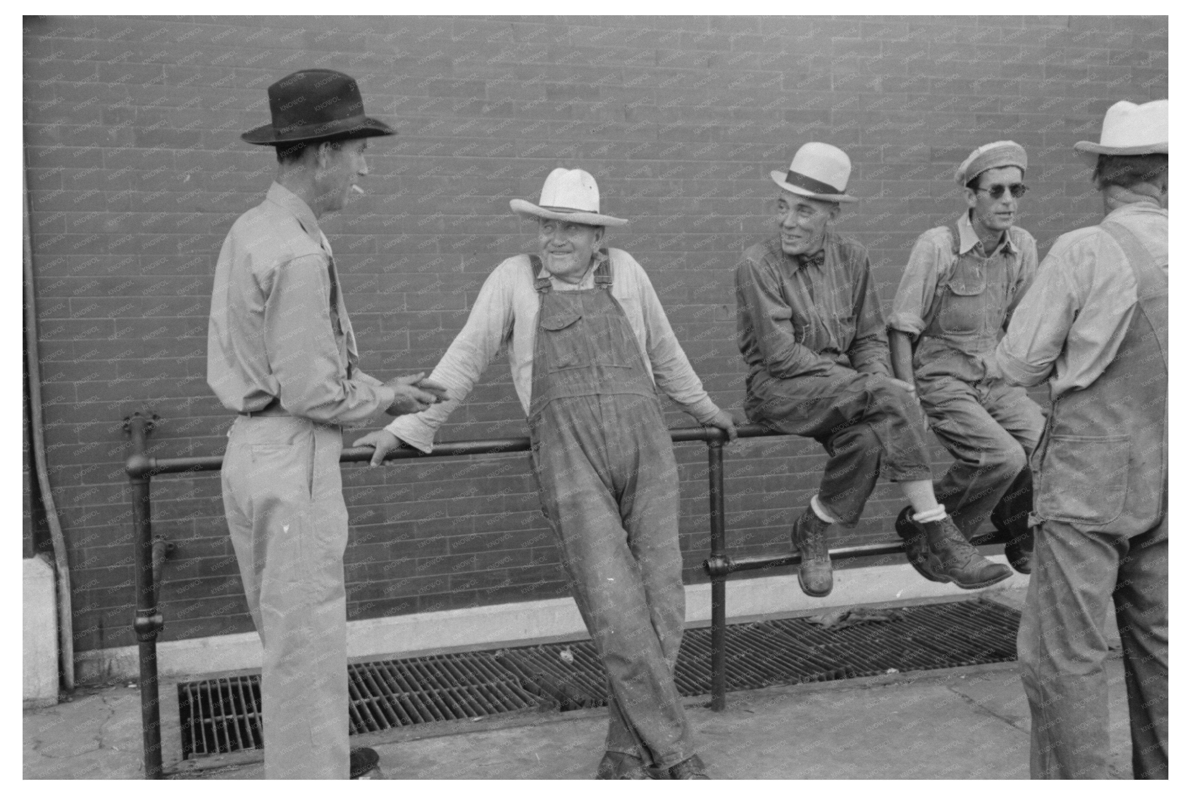 Men Relaxing on Rail in Muskogee Oklahoma July 1939