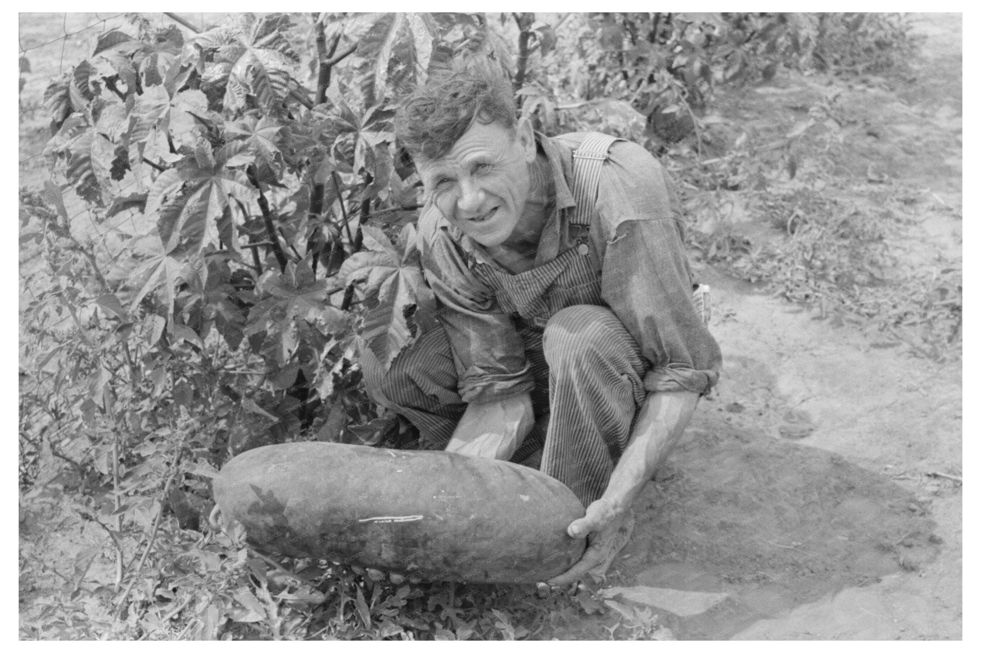 Mr. Shoenfeldt with Watermelon from Tile Garden 1939