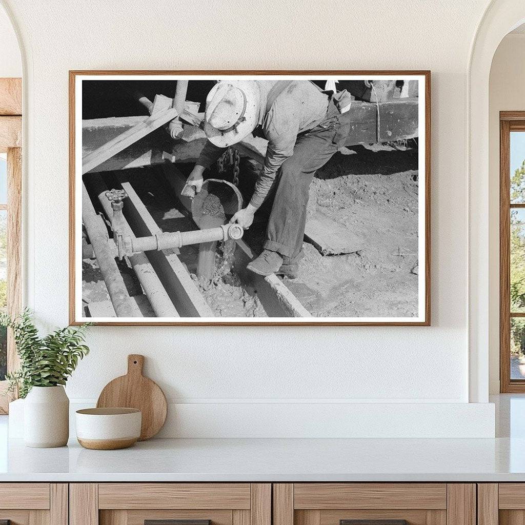 Oil Field Worker Examines Drilling Mud August 1939