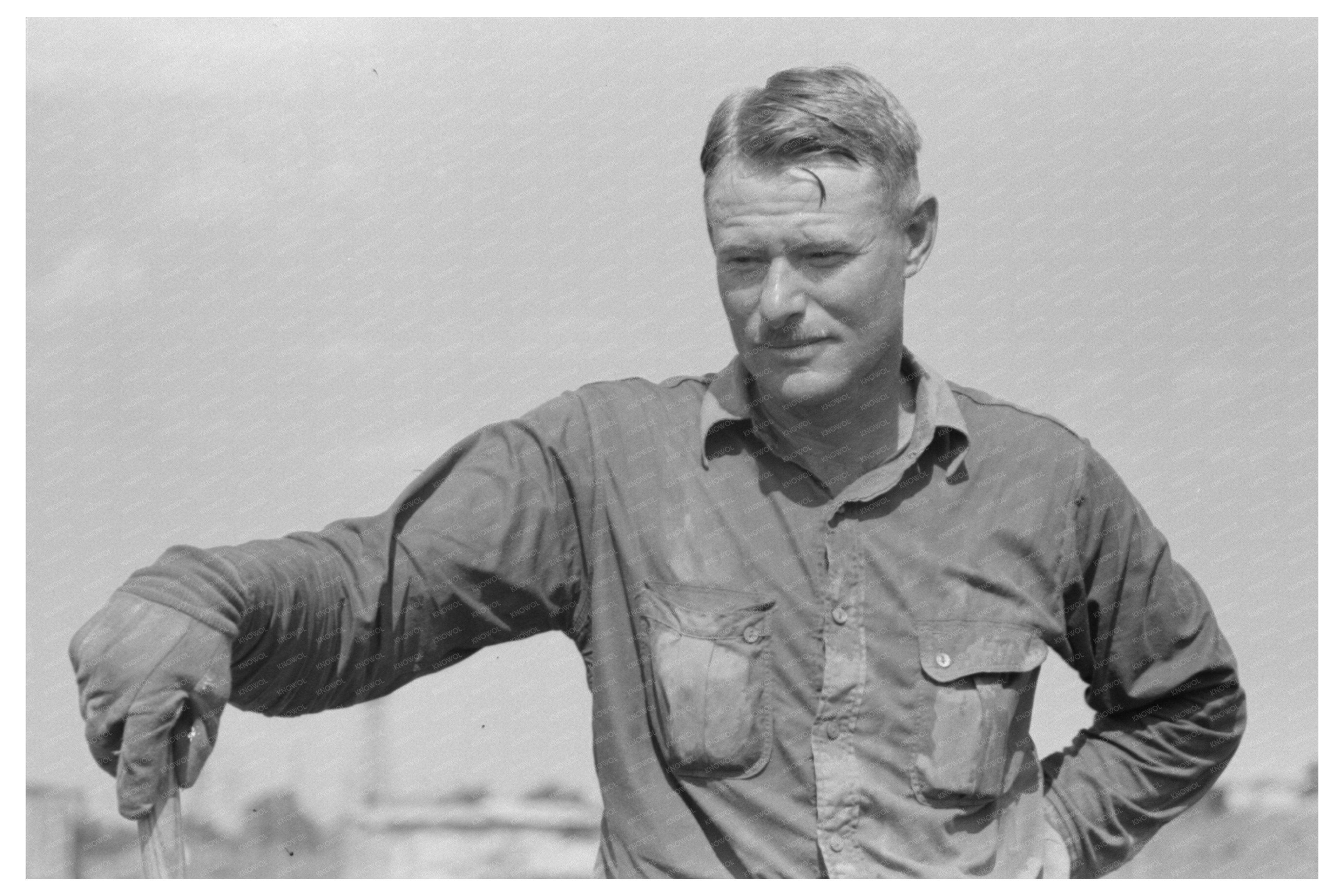 Roustabout at Seminole Oil Field Oklahoma August 1939