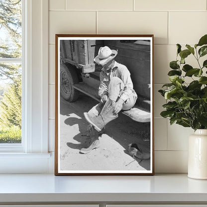 Mr. Johnson Putting on Boots Near Syracuse Kansas 1939