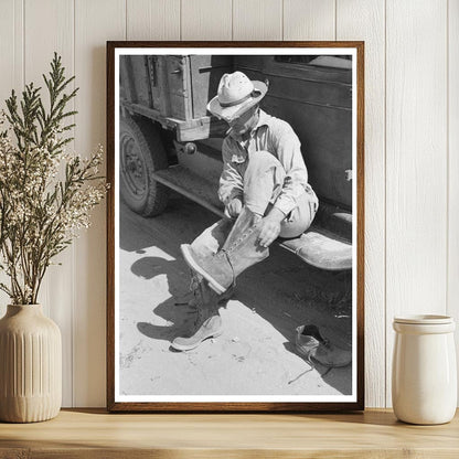 Mr. Johnson Putting on Boots Near Syracuse Kansas 1939