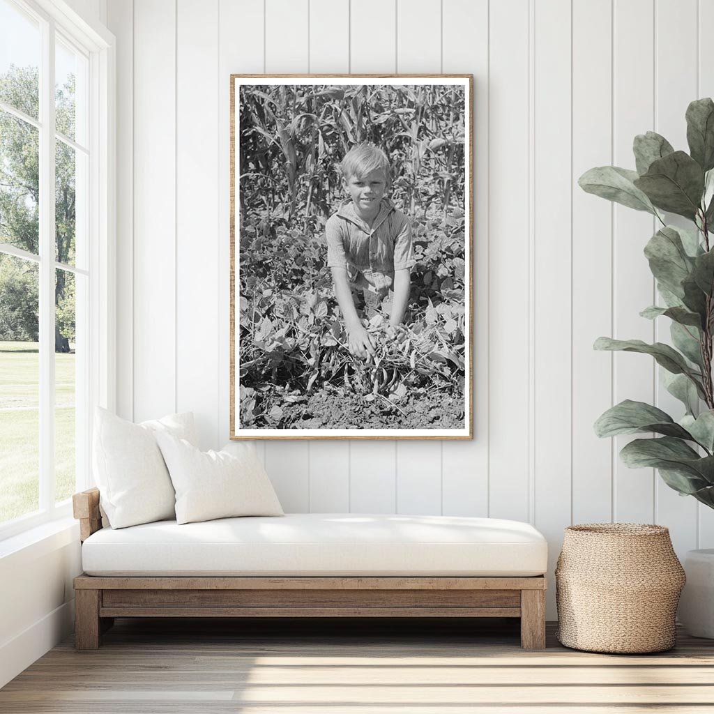 Child on Kansas Farm with String Bean Vines August 1939