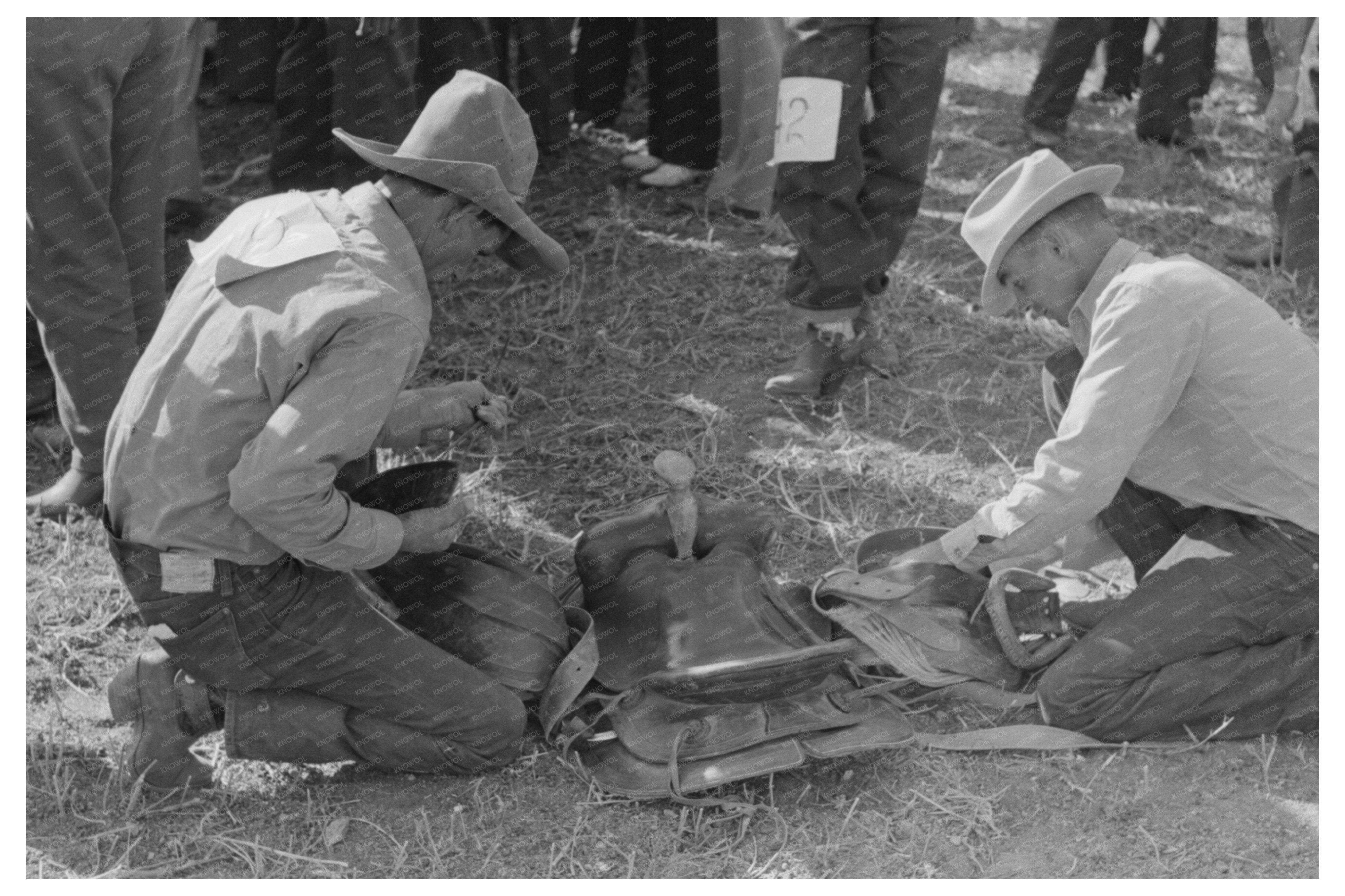 Bean Day Rodeo Contestant Examines Saddle 1939