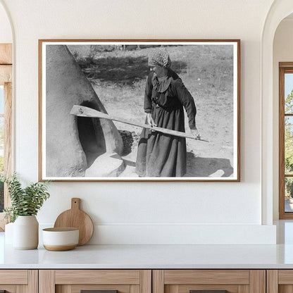 Spanish-American Woman Testing Earthen Oven Temperature 1939