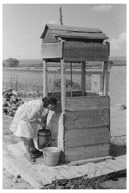 Daughter of Spanish-American Family Drawing Water 1939