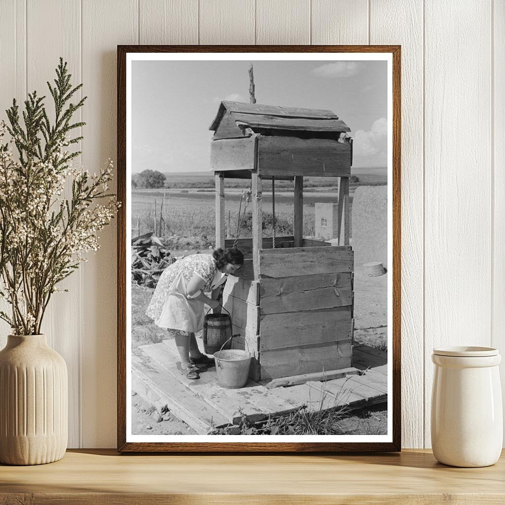 Daughter of Spanish-American Family Drawing Water 1939