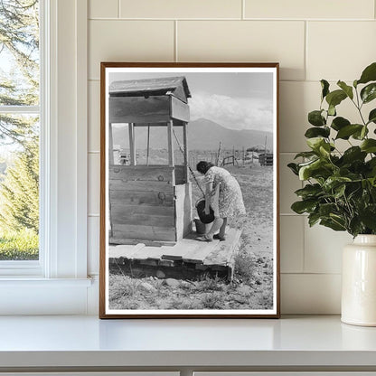 Daughter Drawing Water at Well Taos County New Mexico 1939