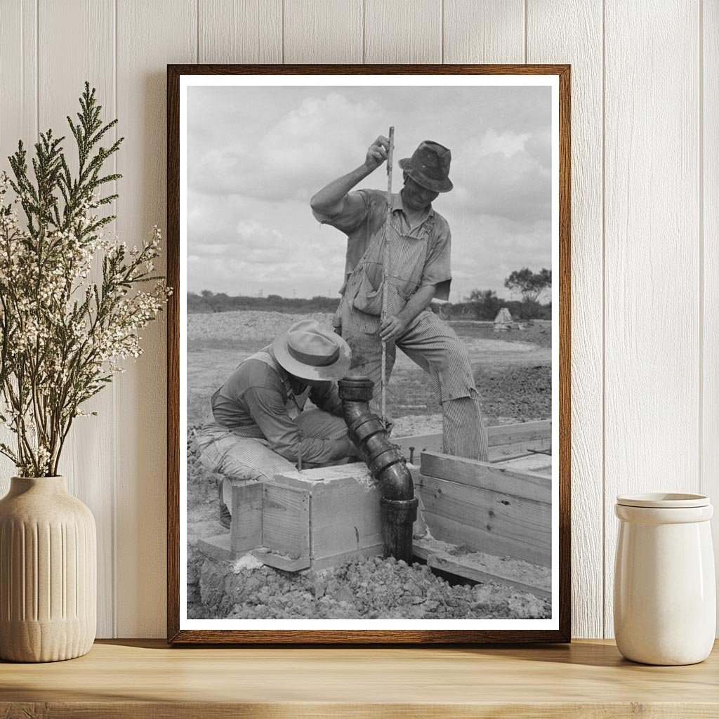 Workman Measuring at Migrant Labor Camp Sinton Texas 1939