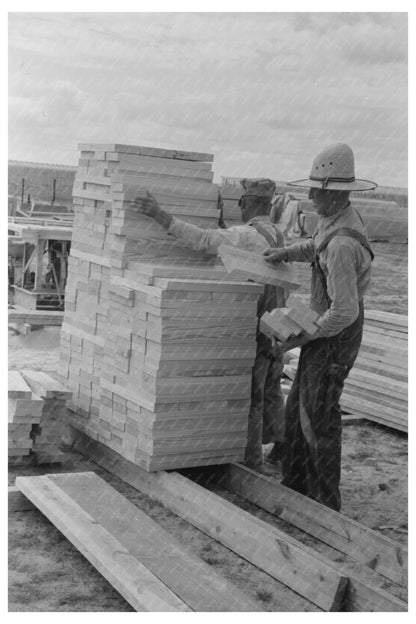 Workers Stacking Wood at Migrant Camp Sinton Texas 1939