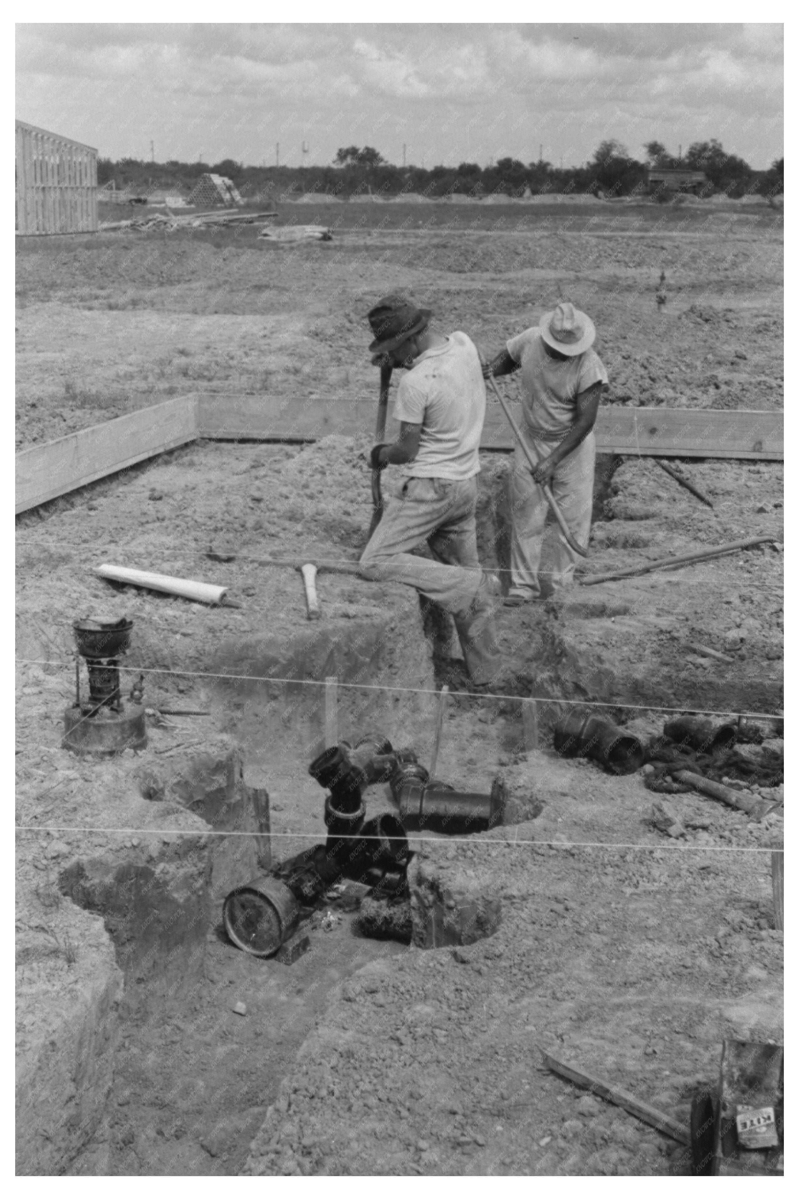 Soldering Cast Iron Sewer Pipe at Migrant Camp 1939