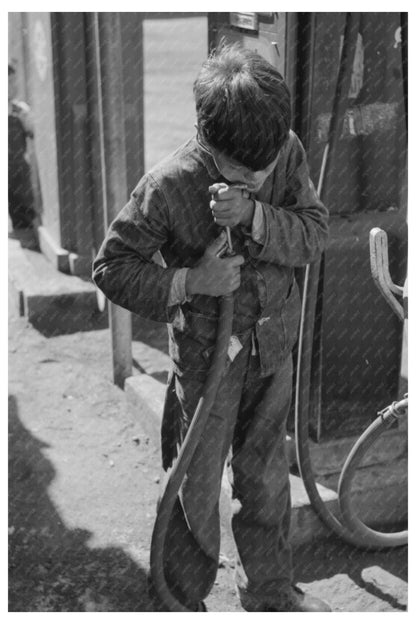 Migrant Boy Drinks from Hose Neches Texas 1939