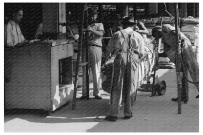 Workers Maneuver Cotton Bale in Houston 1939