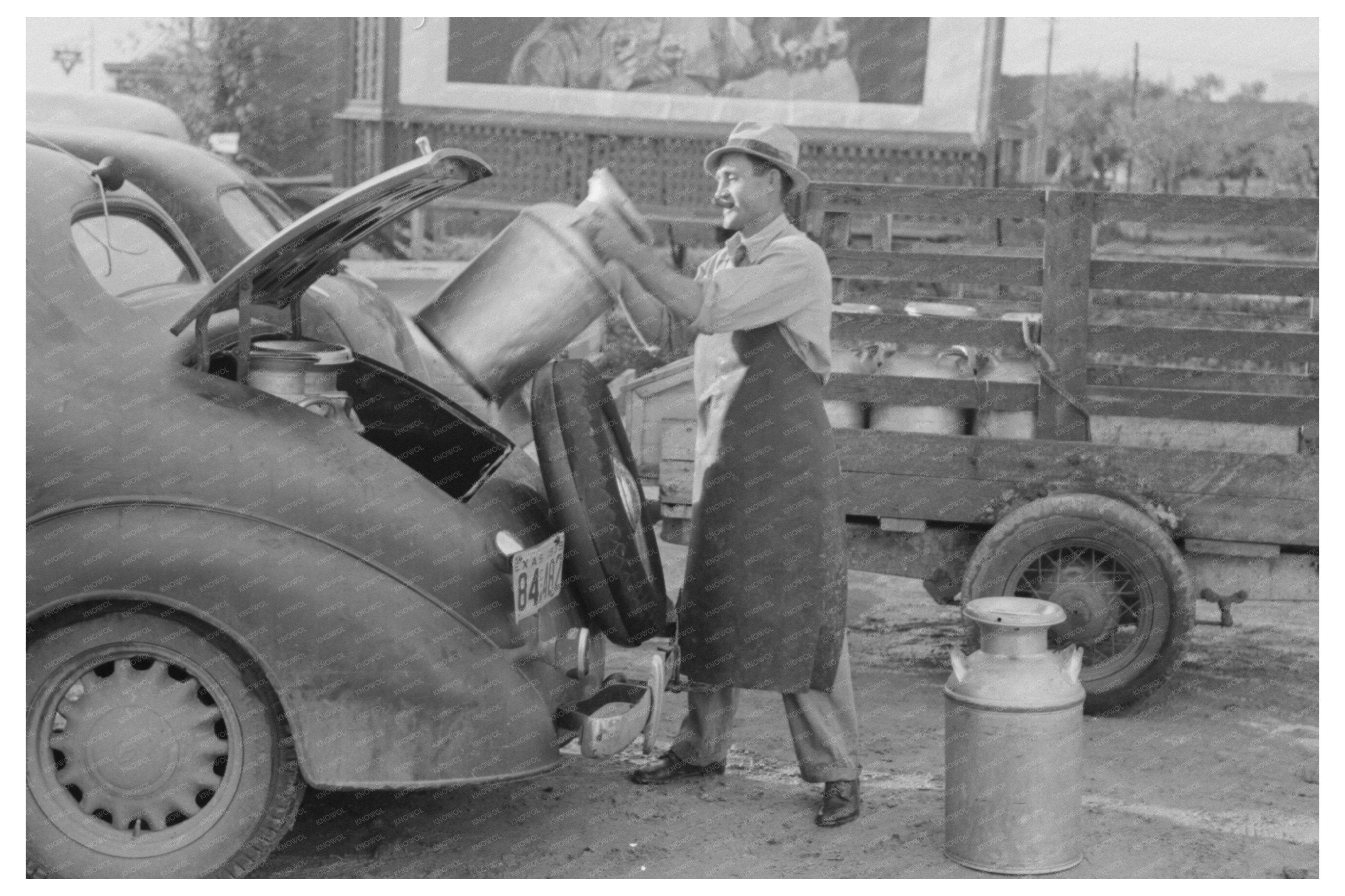 Milk Cans Loaded into Car at San Angelo Creamery 1939