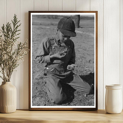 African American Boy Eating Walnuts Oklahoma 1944