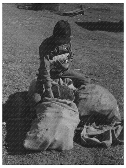 Young Boy Eating Black Walnuts on Farm 1944