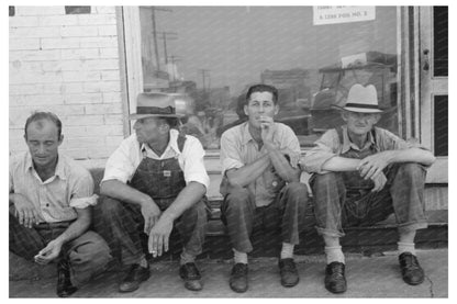 Men Seated on Sidewalk in Muskogee Oklahoma 1939