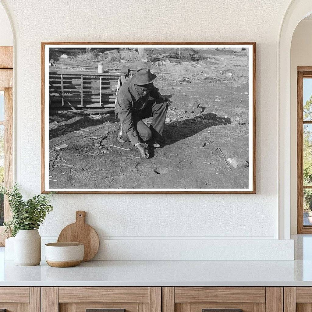 Child Playing Marbles in Eufaula Oklahoma February 1940