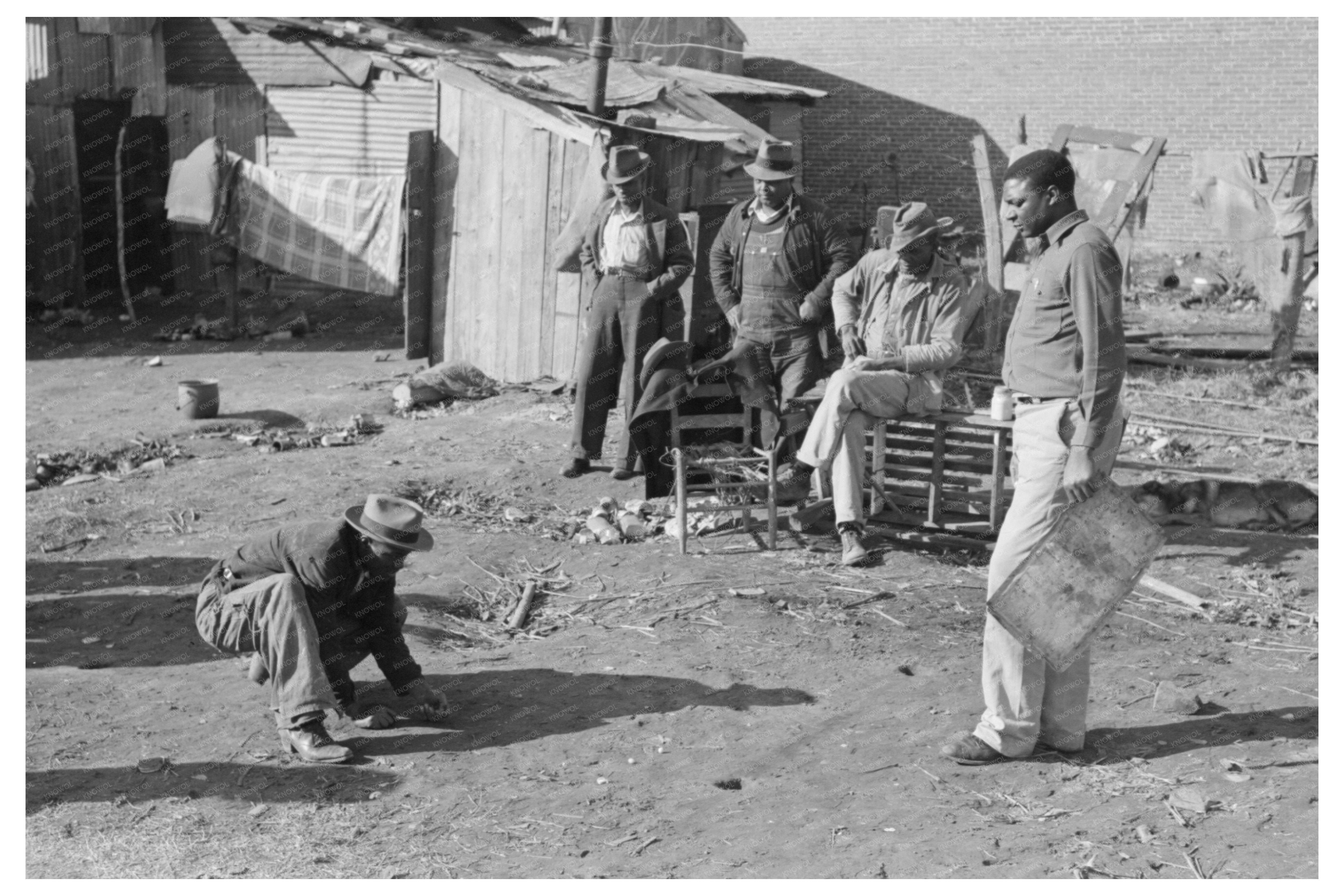 Boy Playing Marbles in Eufaula Oklahoma February 1940