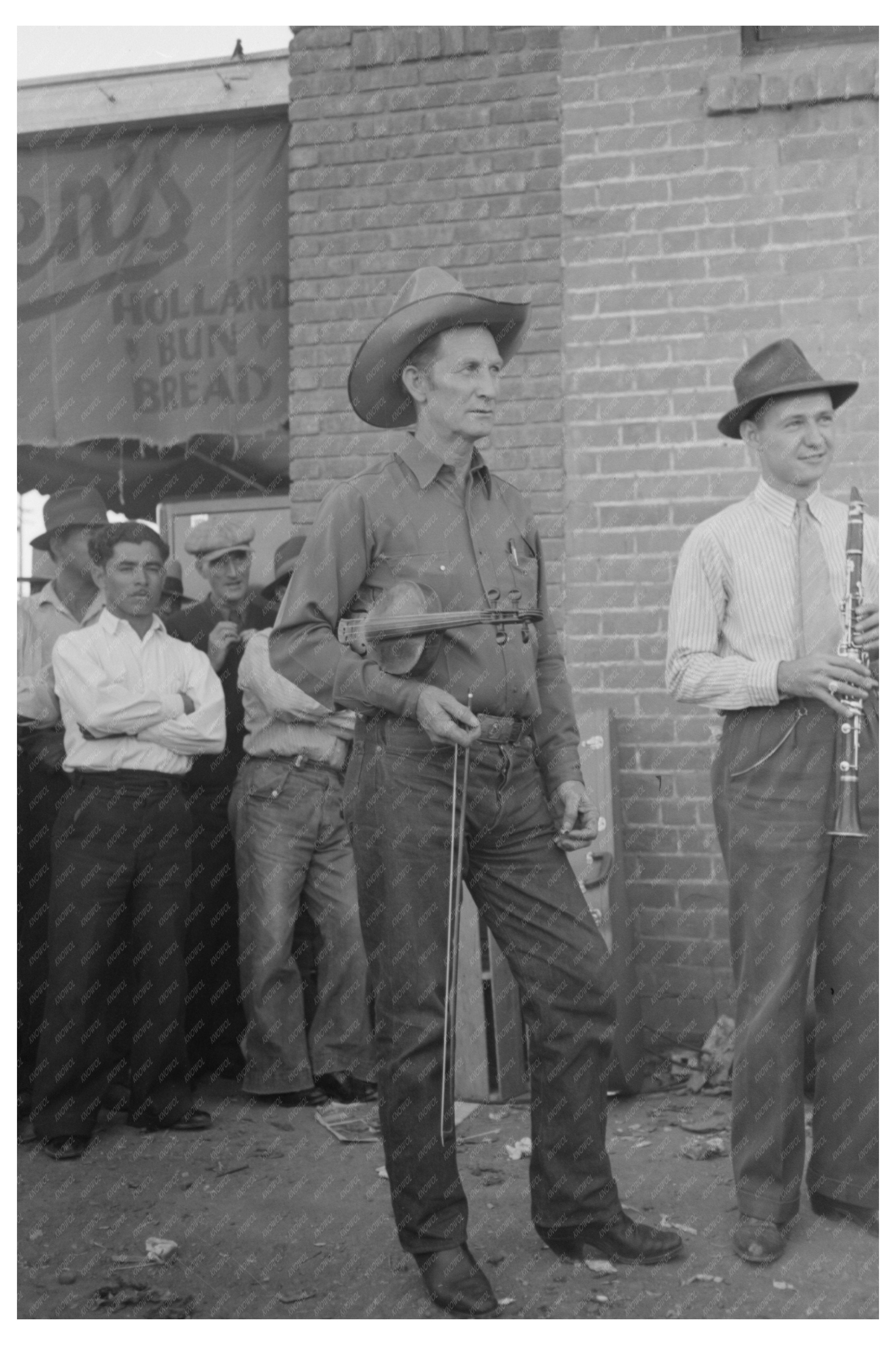 Orchestra Member Tuning Violin in Phoenix 1944