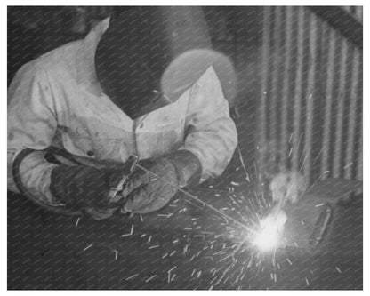 Worker Repairs Farmers Truck with Electric Welder 1940