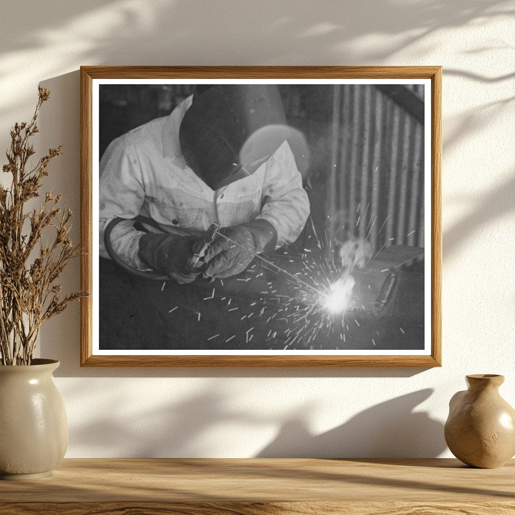 Worker Repairs Farmers Truck with Electric Welder 1940