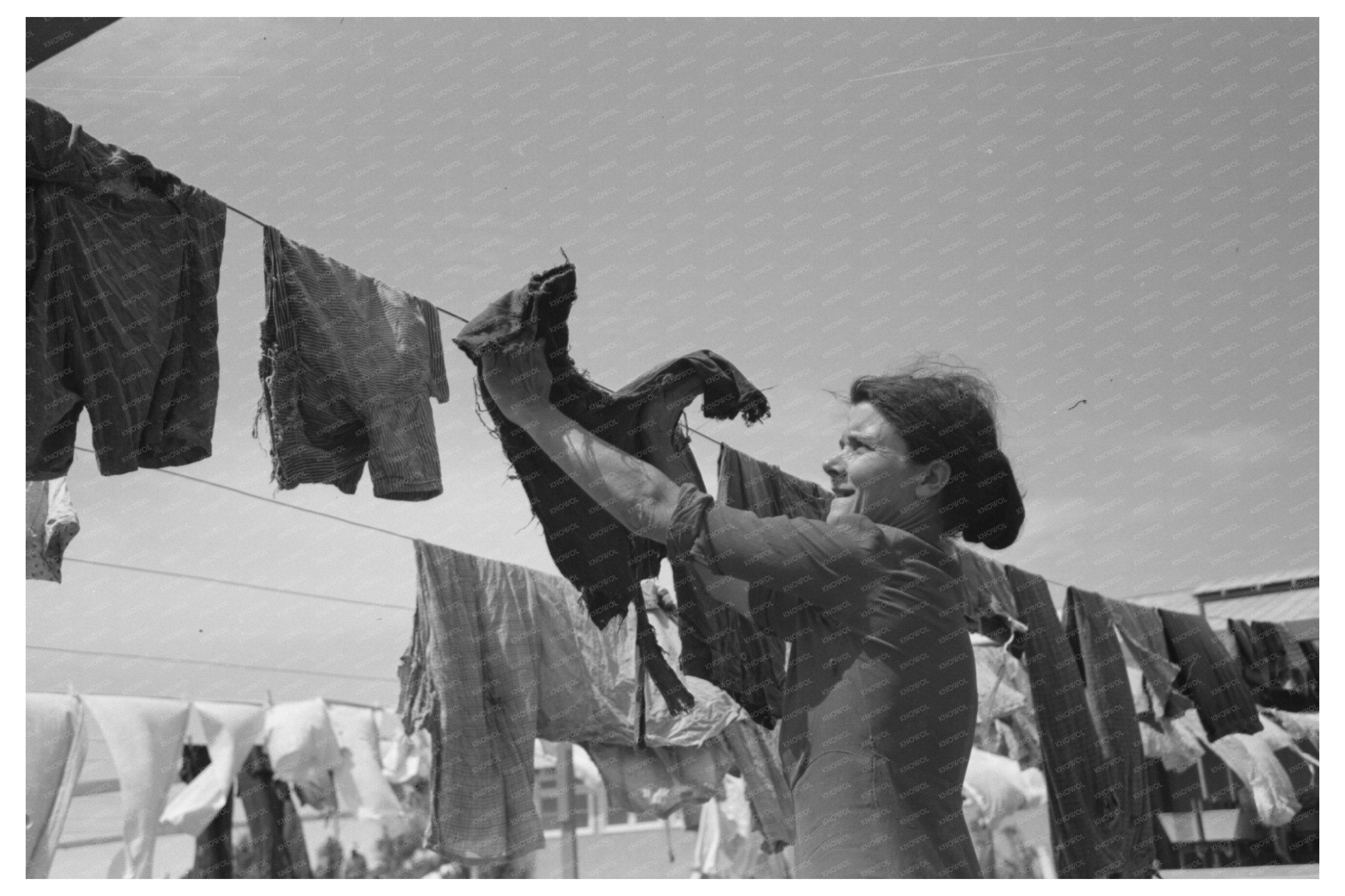 Wife of Migratory Worker Hanging Laundry Arizona 1940