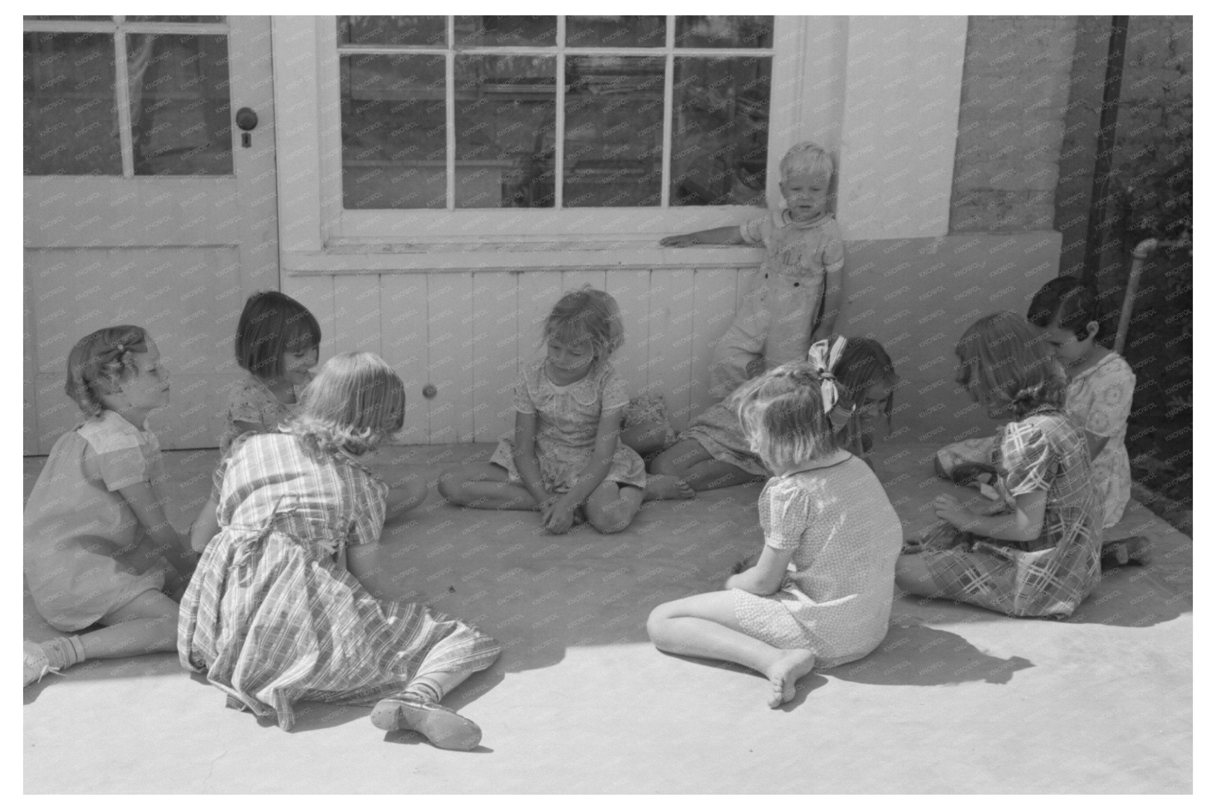 Little Girl Playing Jacks in Arizona April 1940