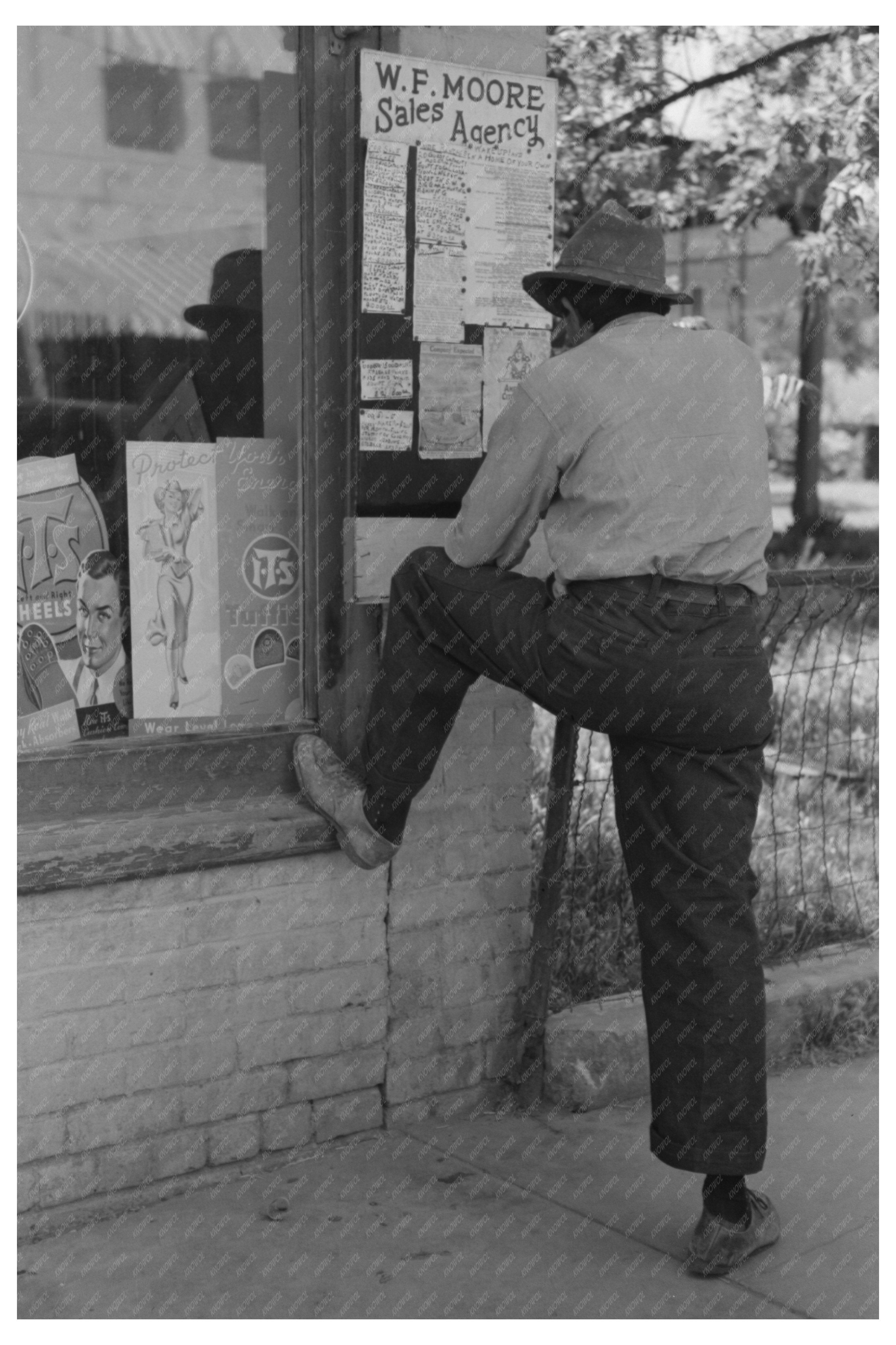 Man Examining Sign in Silver City New Mexico April 1940