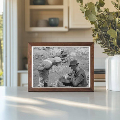 Miner Examines Pan with Prospector in Pinos Altos 1940