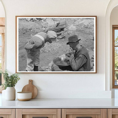 Miner Examines Pan with Prospector in Pinos Altos 1940