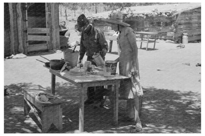 Doris and Faro Caudill Preparing Dinner Pie Town 1940