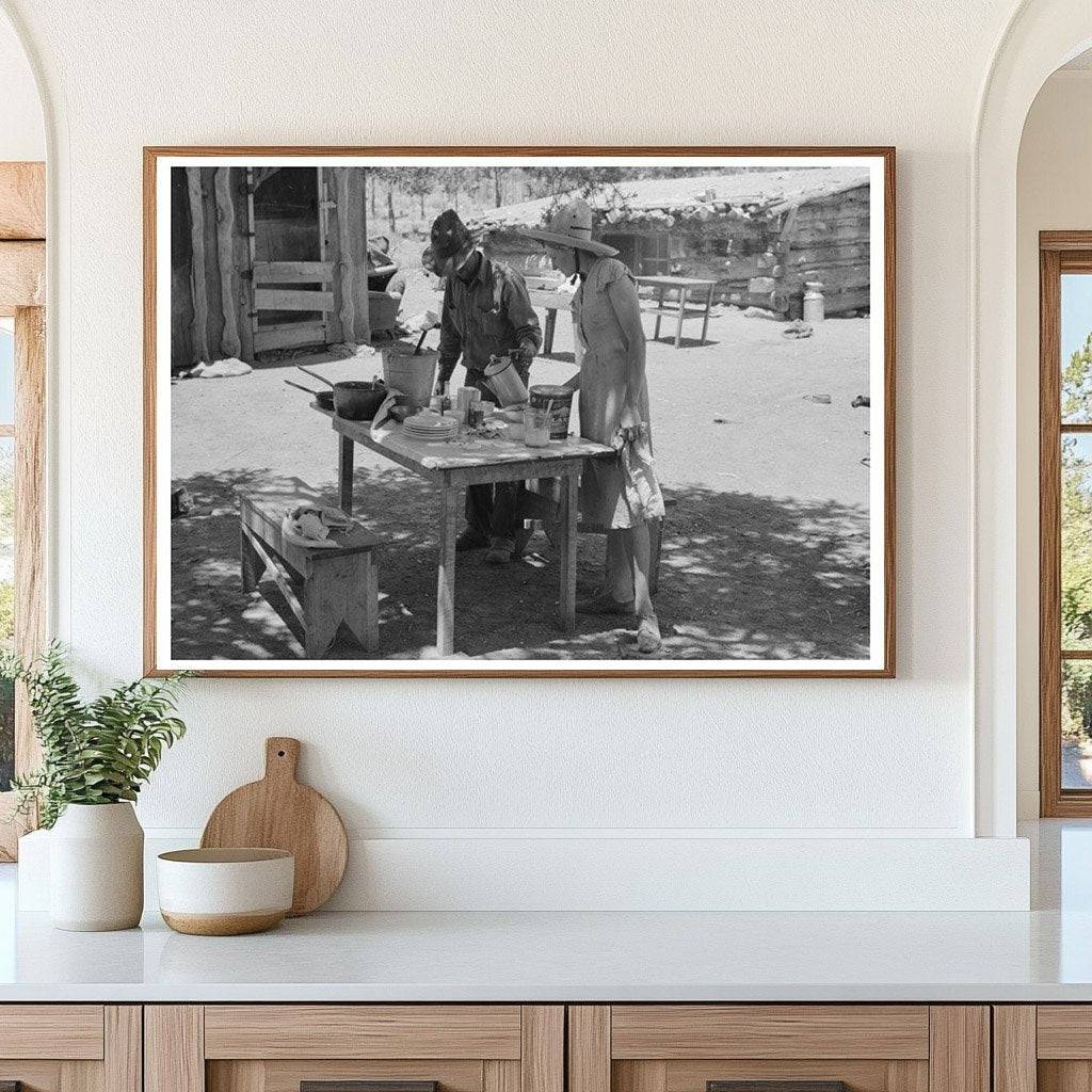 Doris and Faro Caudill Preparing Dinner Pie Town 1940