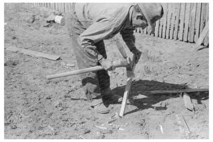 Faro Caudill Builds Tent Posts in Pie Town New Mexico 1940