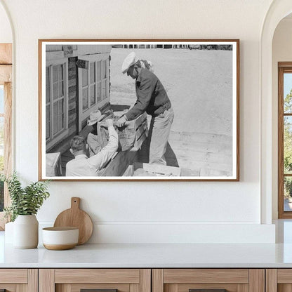 Mr. Keele Unloading Grapefruit in Pie Town New Mexico 1940