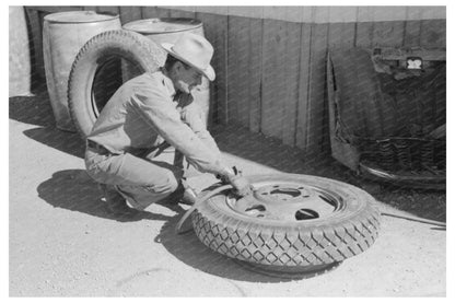 Tire Change at Garage in Pie Town New Mexico 1940