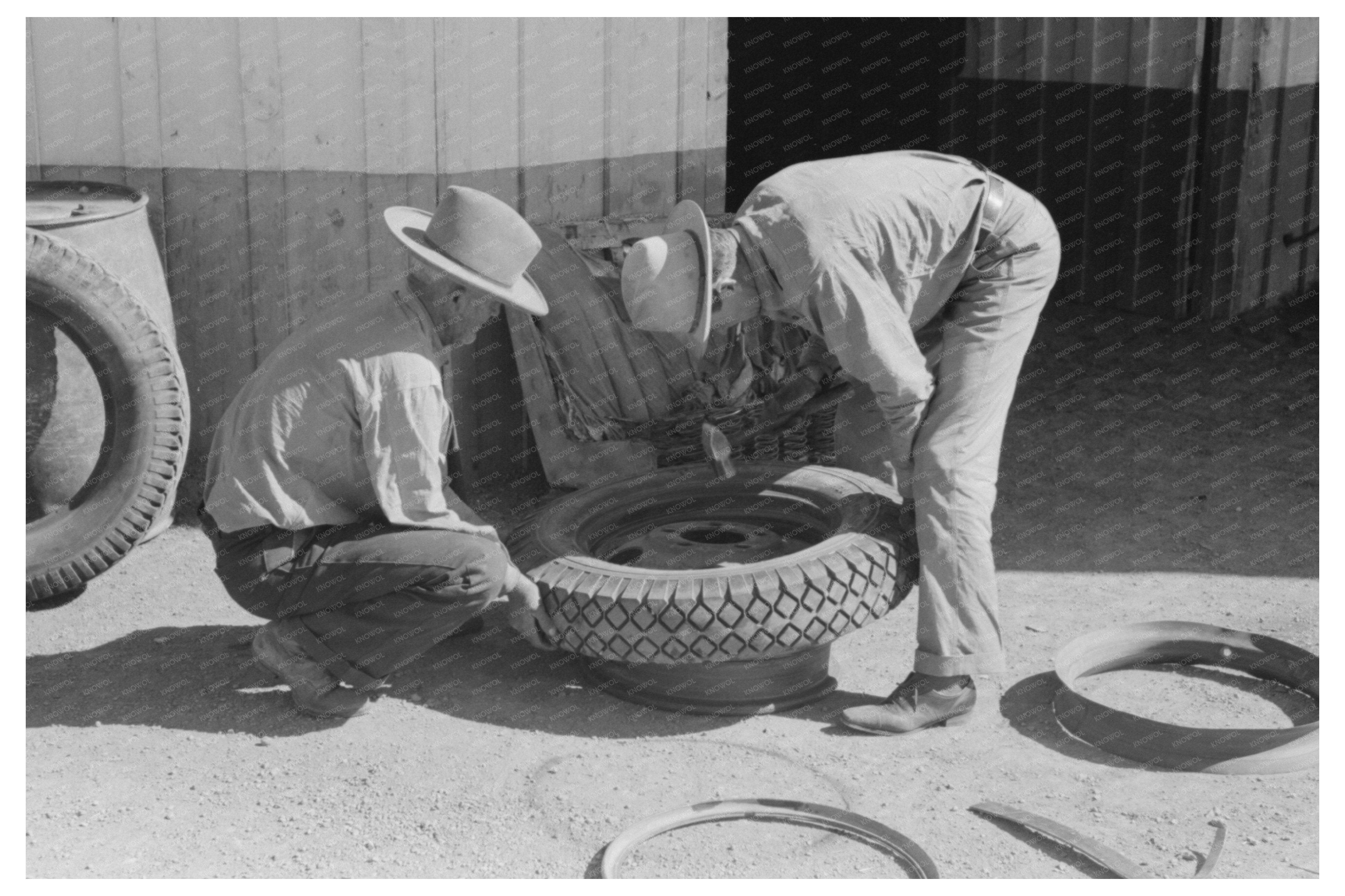 Tire Changing at Garage in Pie Town New Mexico 1940