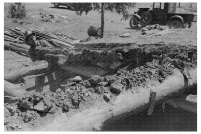 John Adams Removing Pinon Pole from Dugout 1940