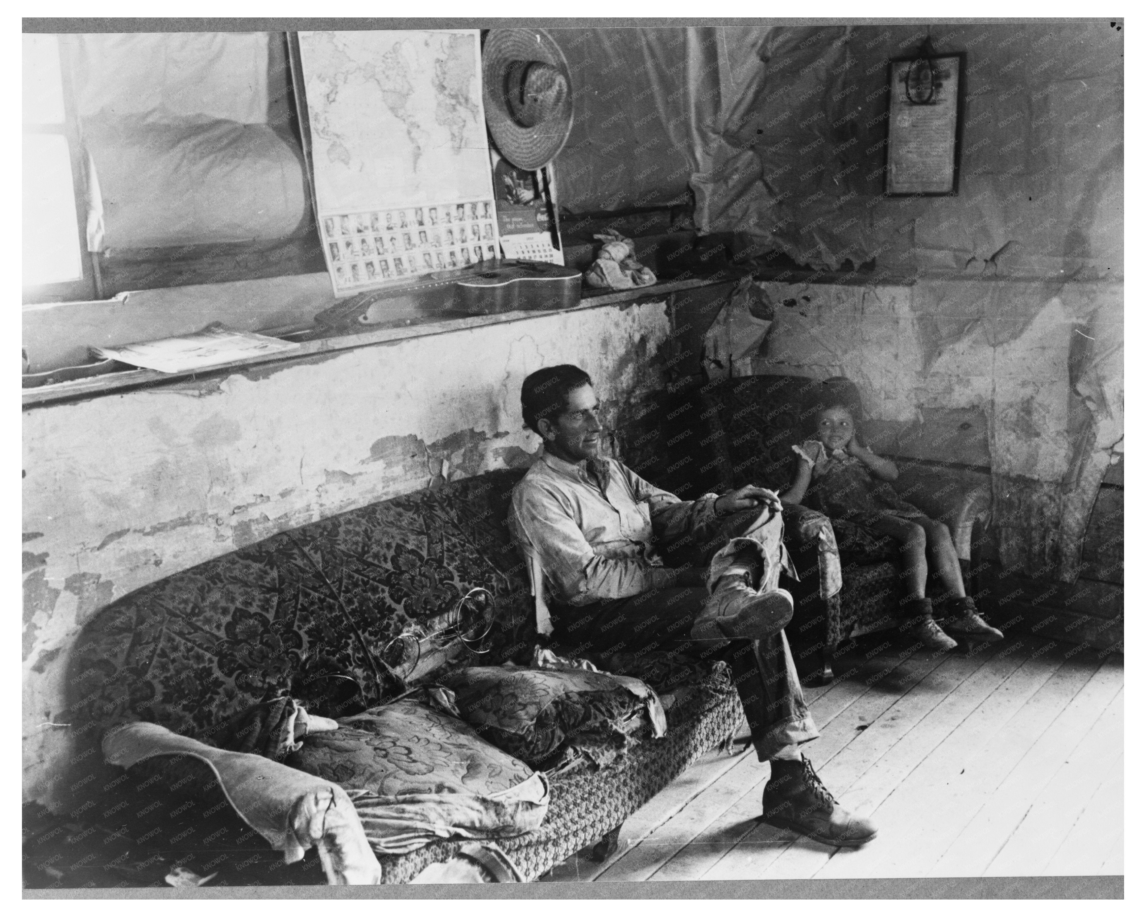 Faro Caudill and Daughter in Dugout Home Pie Town 1940