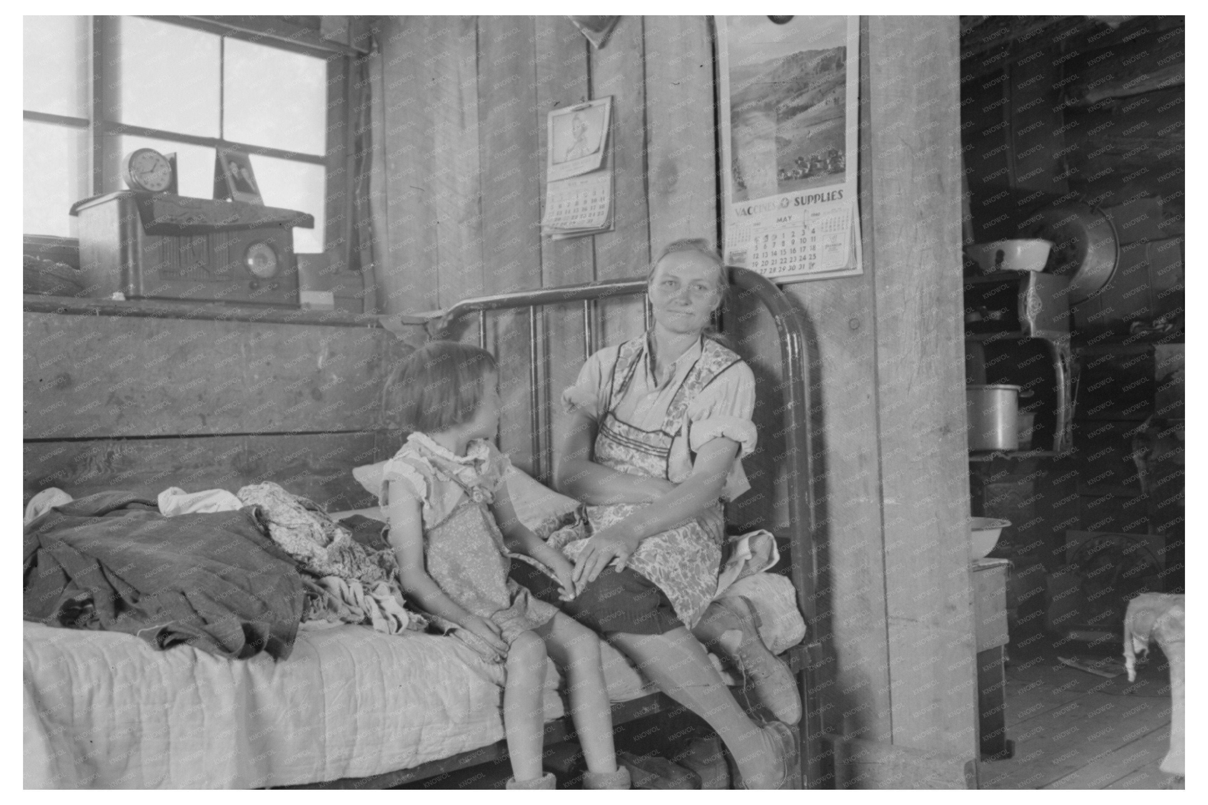 Mrs. Caudill and Daughter in Pie Town Dugout Home 1940