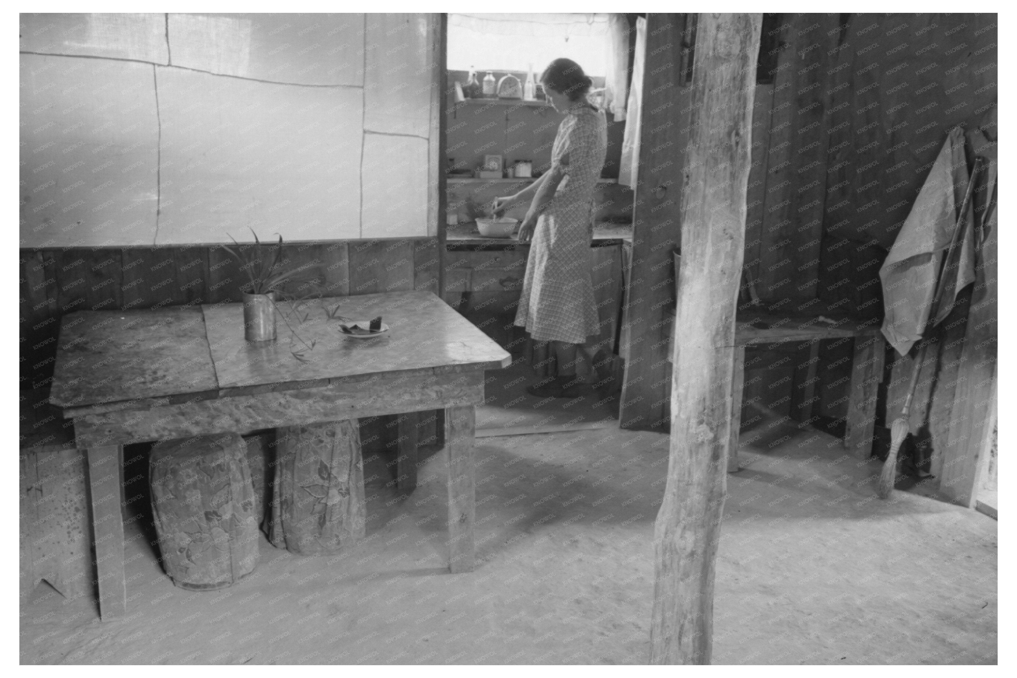 Woman by Adobe House in Pie Town New Mexico 1940