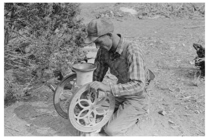 Jack Whinery Grinding Pinto Beans in Pie Town 1940
