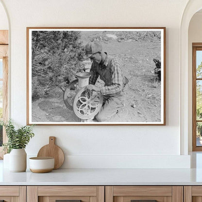 Jack Whinery Grinding Pinto Beans in Pie Town 1940